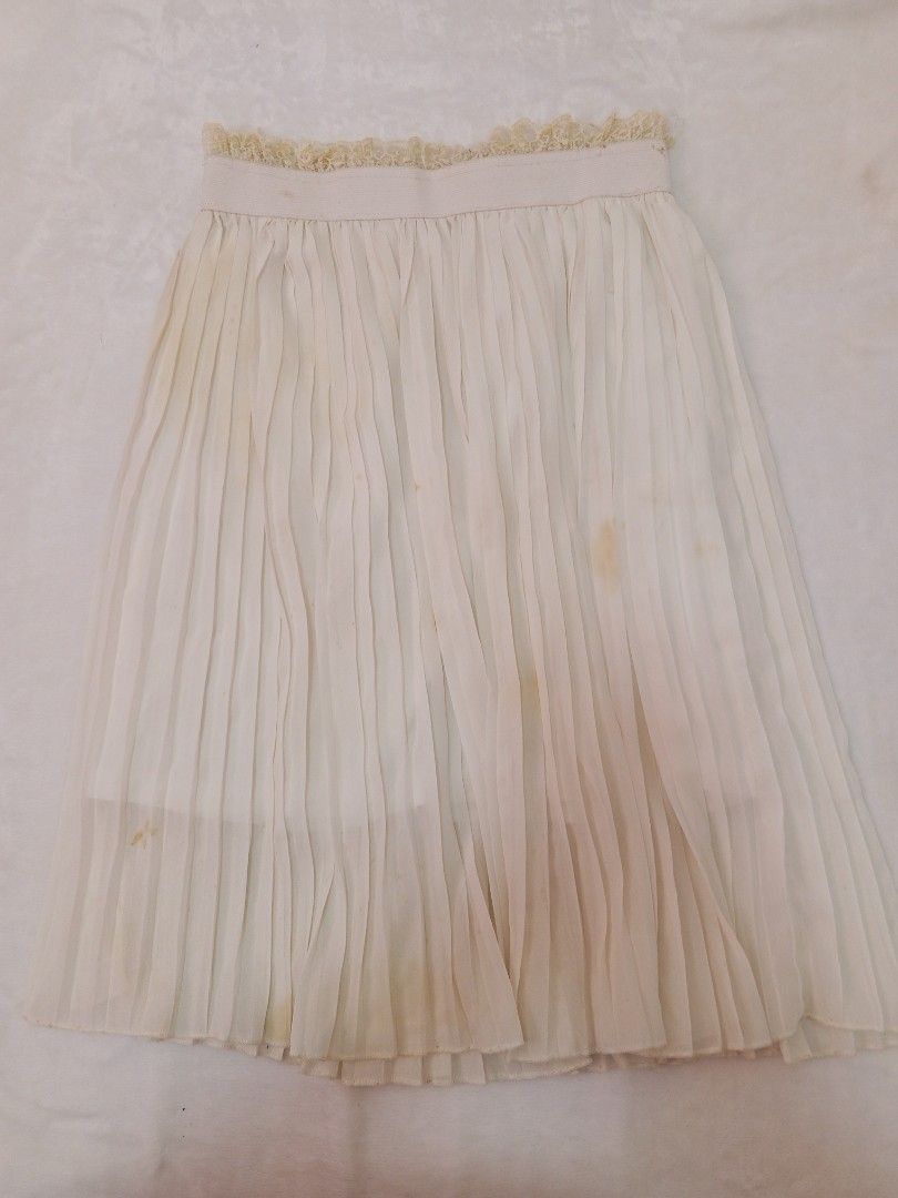Long Skirts Bundle: Black, Plaid, and White Pleated (Category: Skirts) located in Manila. Submitted by aly_chy (Listing ID 1440262546, Image 3). Description: - Black midi skirt with 'LOVE' waistband | Free Size | Garterized - Pastel plaid mini skirt | L | Back Zipper & Garterized - White pleated midi skirt (has yellow stains) | Free Size | Garterized.