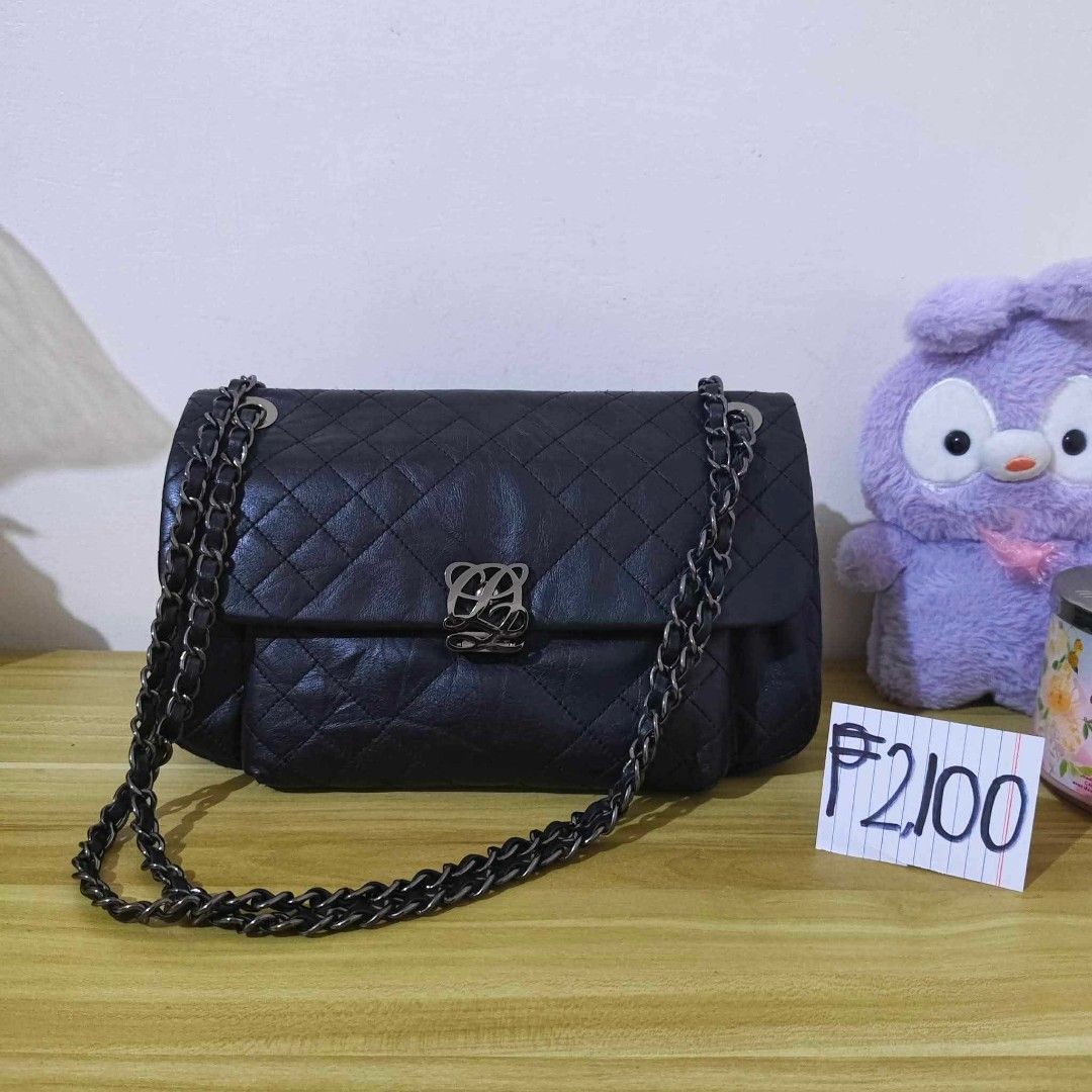 Louis Quatorze — Quilted Black Leather Flap Bag (Category: Shoulder Bags) located in San Pedro. Submitted by riavskz (Listing ID 1440286453, Image 1). Description: 👜 Louis Quatorze — Quilted Black Leather Flap Bag • Japan/Korea sourced preloved bag • Soft genuine leather with full diamond quilting (front, back, and sides) • Black colorway • Classic quilted flap crossbody silhouette • Structured rectangular shape, compact yet functional • Flap-ov