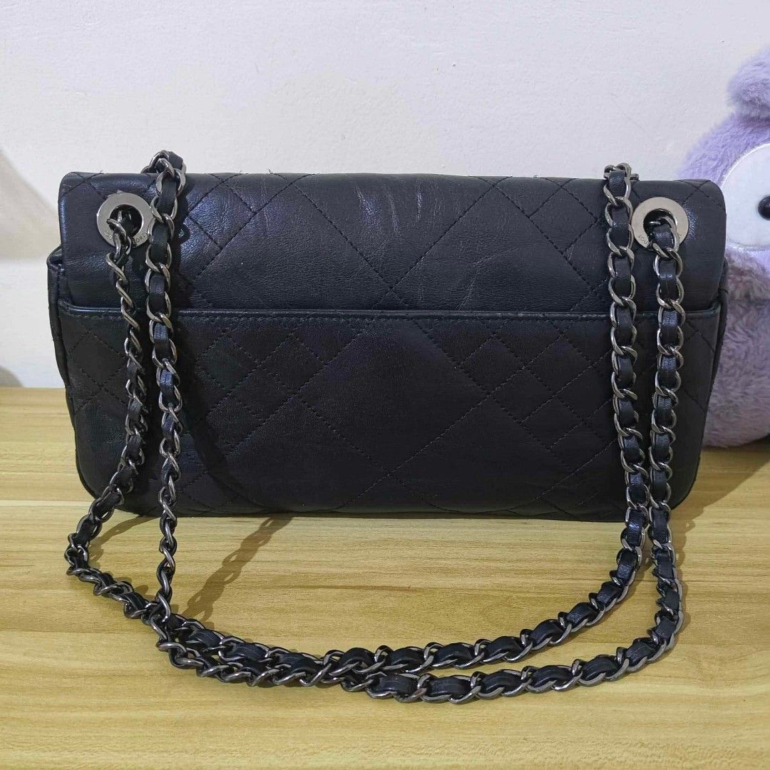 Louis Quatorze — Quilted Black Leather Flap Bag (Category: Shoulder Bags) located in San Pedro. Submitted by riavskz (Listing ID 1440286453, Image 2). Description: 👜 Louis Quatorze — Quilted Black Leather Flap Bag • Japan/Korea sourced preloved bag • Soft genuine leather with full diamond quilting (front, back, and sides) • Black colorway • Classic quilted flap crossbody silhouette • Structured rectangular shape, compact yet functional • Flap-ov