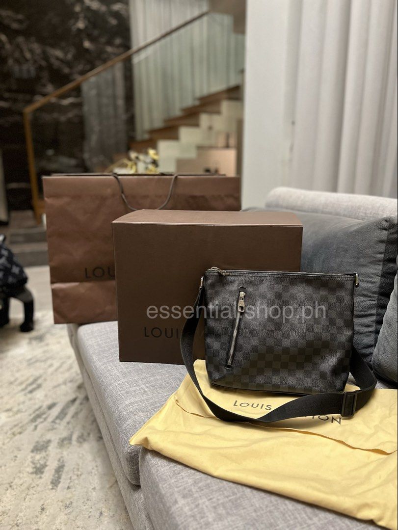 Louis Vuitton LV Mick PM Damier Graphite 2014 (Category: Luxury Bags & Wallets) located in Manila. Submitted by essential.shop.ph (Listing ID 1418749655, Image 1). Description: Complete inclusions. Paper bag (brown), box, dust bag, cards and receipt (PDF email from LV store). Bought from LV Peninsula Hotel, Hong Kong, China in 2014. Was serviced by LV on 2015 for some loose stitching. No issues asides scratches on the zipper pulls and zipper. Fad