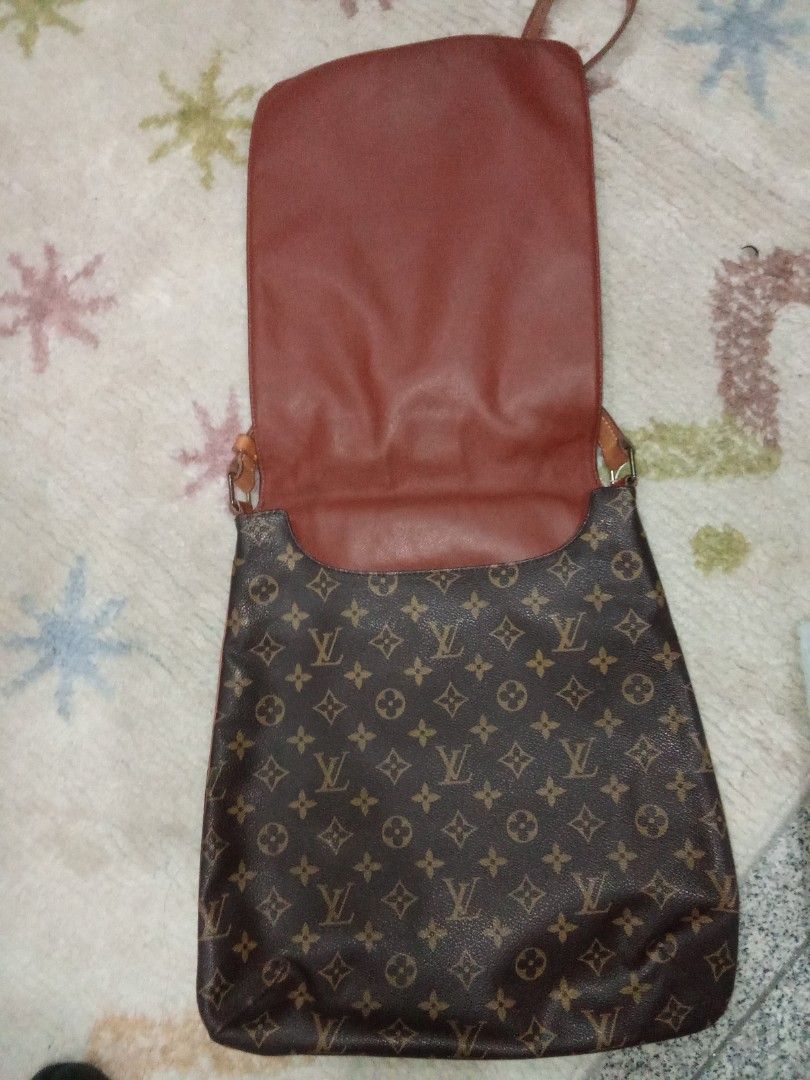 Louis Vuitton Monogram Shoulder Bag Authentic (Category: Luxury Bags & Wallets) located in Manila. Submitted by christoph17 (Listing ID 1440340417, Image 2). Description: - Classic Louis Vuitton monogram shoulder bag - Color: Brown canvas with leather trim and strap - Closure: Flap - Interior lining: Leather - Strap: Adjustable - Condition: Some signs of wear on leather strap and hardware - Overall: Great everyday bag Authentic .