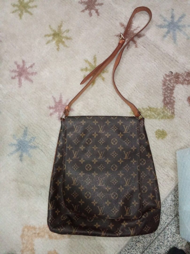Louis Vuitton Monogram Shoulder Bag Authentic (Category: Luxury Bags & Wallets) located in Manila. Submitted by christoph17 (Listing ID 1440340417, Image 1). Description: - Classic Louis Vuitton monogram shoulder bag - Color: Brown canvas with leather trim and strap - Closure: Flap - Interior lining: Leather - Strap: Adjustable - Condition: Some signs of wear on leather strap and hardware - Overall: Great everyday bag Authentic .