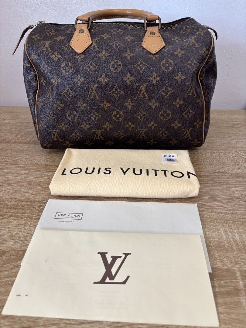 Louis Vuitton Monogram Speedy 30 Handbag (Category: Luxury Bags & Wallets) located in Cabuyao City. Submitted by HelloSunshineDeclutters (Listing ID 1440229257, Image 1). Description: Slightly Negotiable - Authentic Louis Vuitton Speedy 30 handbag - Classic Monogram canvas - Vachetta leather trim and handles - Includes dust bag and Louis Vuitton paperwork - Seldom Used - Bought from Greenbelt 4 - With dustbag and Original Receipt under my name - 