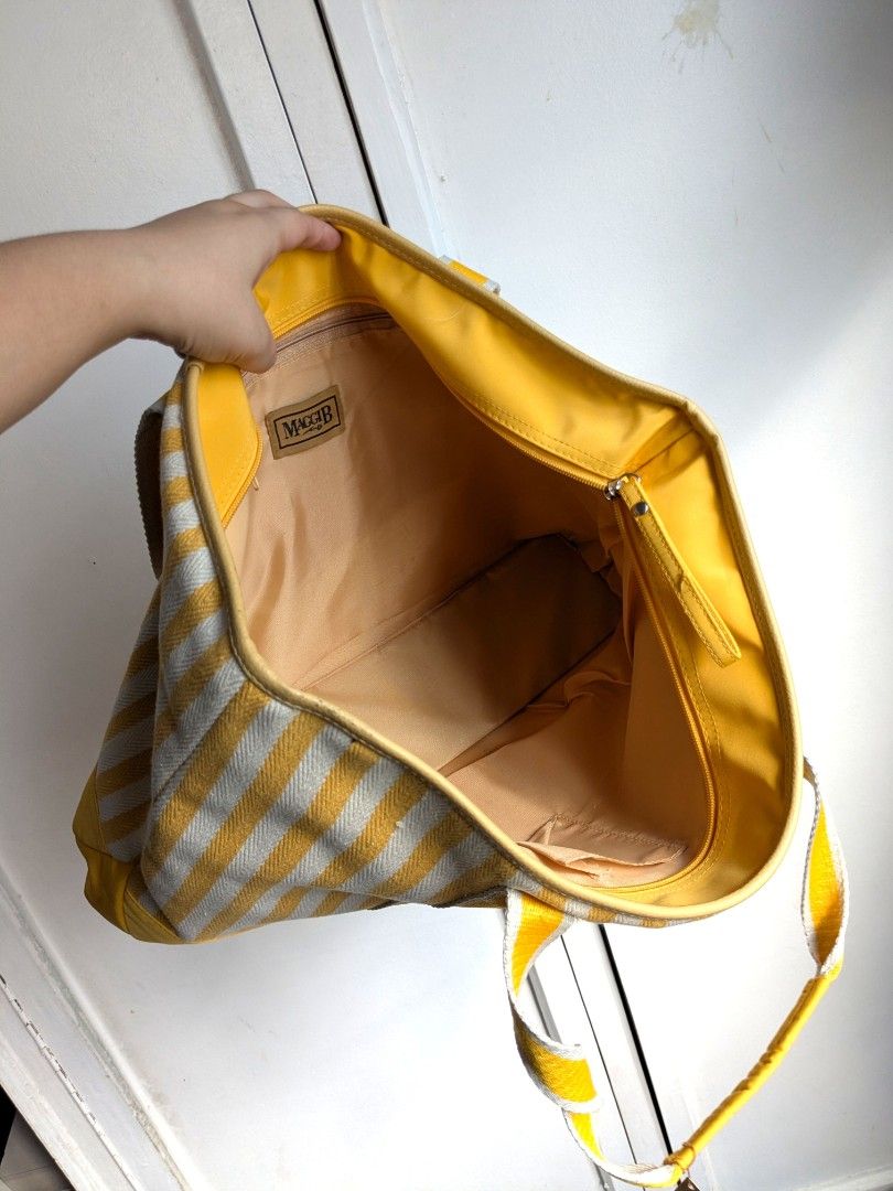 Maggi B 1976 Canvas Pinstriped Tote Bag (Category: Tote Bags) located in Quezon City. Submitted by nnncorner (Listing ID 1440323647, Image 3). Description: Maggi B 1976 Canvas Pinstriped Tote Bag perfect for travel tote never been used with tags original price - 8900 yen / 3,450 in pesos length 13 inches width 20 inches selling only for 1,280.
