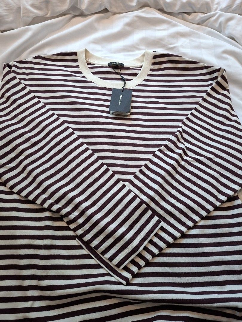 Massimo Dutti Striped Long Sleeve Shirt (Category: Longsleeves) located in Manila. Submitted by pupsik.tan (Listing ID 1440271398, Image 2). Description: - Classic long sleeve shirt from Massimo Dutti. - Features stylish burgundy and white stripes. - Cream colored neckline and cuffs for a refined touch. - Designed for a comfortable fit. - Versatile for casual outfits or as a layering piece..