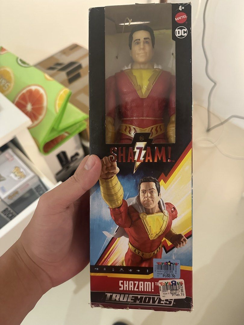 Mattel DC Comics Shazam! True Moves Action Figure (Category: Figurines & Statues) located in Quezon City. Submitted by micorgi (Listing ID 1440370808, Image 1). Description: - Mattel DC Comics Shazam! action figure - True Moves line - Figure is new and sealed in original packaging - Box shows some wear and tear, particularly at the bottom corners - Original Toys "R" Us price tag still attached - Ideal for Shazam fans and collectors.