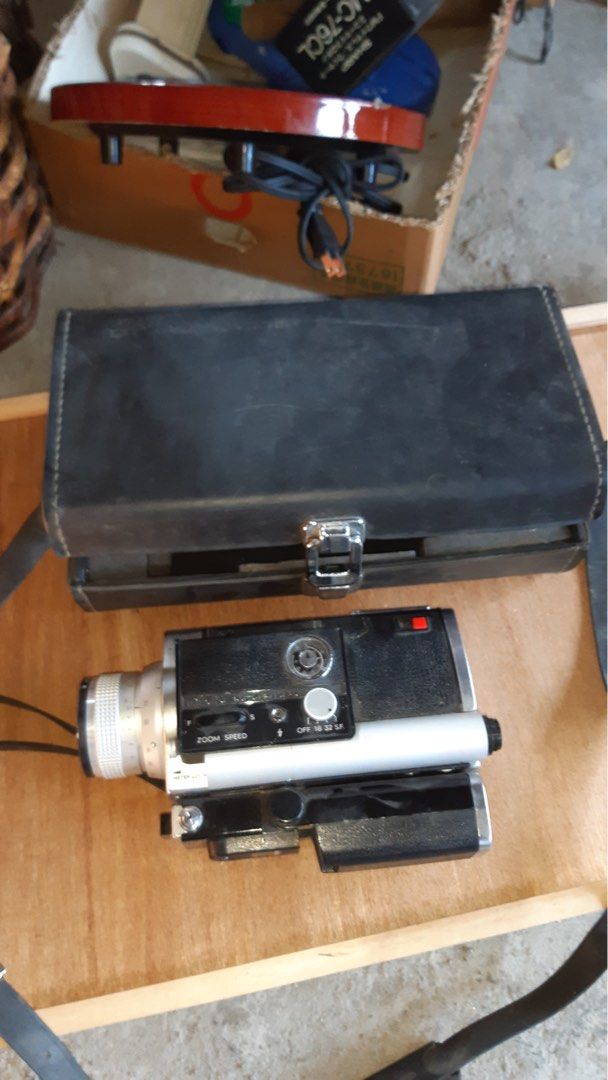 MINOLTA AUTOPAK VINTAGE VIDEOCAMERA (Category: Video Cameras) located in Camiling. Submitted by authpreloveditems (Listing ID 1440309860, Image 3). Description: Vintage Minolta Autopak D6 Super 8 movie camera - Manufactured in the 1970s - Features a 6x zoom lens - Includes a Rokkor f/1.8 8-50mm lens - Built-in light meter supports ASA 25-100 daylight and 40-160 tungsten film - Powered by four AA batteries - Uses standard Super 8 film cassettes - 