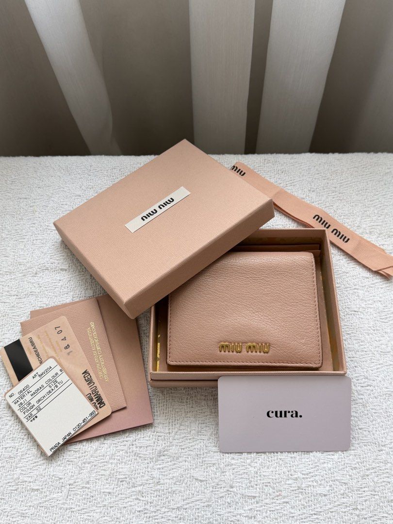 MIU MIU Madras Leather Wallet (Category: Luxury Bags & Wallets) located in San Simon. Submitted by mystic_me (Listing ID 1440318214, Image 1). Description: MIU MIU Madras Leather Wallet — pink colorway — rank A — comes with original box, ribbon, paper bag & authenticity cards a soft statement piece crafted in Miu Miu’s signature Madras leather ✨ 100% authentic comment or dm to purchase ♡ #curapurseph #miumiu #miumiuwallet #madrasleather #pinkwall