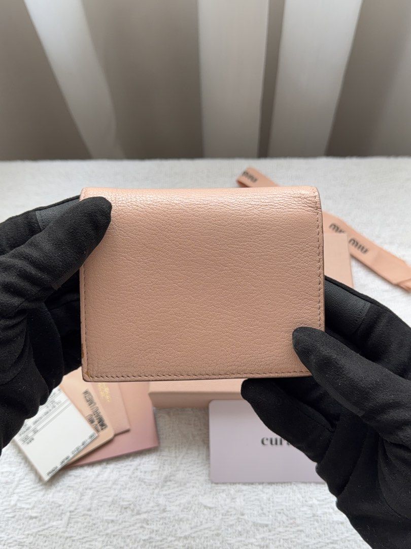 MIU MIU Madras Leather Wallet (Category: Luxury Bags & Wallets) located in San Simon. Submitted by mystic_me (Listing ID 1440318214, Image 3). Description: MIU MIU Madras Leather Wallet — pink colorway — rank A — comes with original box, ribbon, paper bag & authenticity cards a soft statement piece crafted in Miu Miu’s signature Madras leather ✨ 100% authentic comment or dm to purchase ♡ #curapurseph #miumiu #miumiuwallet #madrasleather #pinkwall