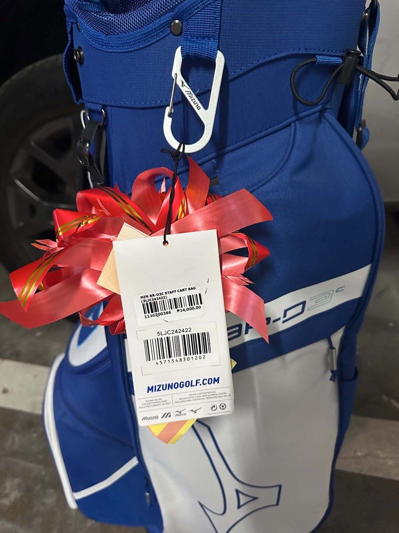 Mizuno Golf bag - Blue/White (Category: Golf) located in Cebu City. Submitted by cha0213 (Listing ID 1440263006, Image 2). Description: - Mizuno BR-D3 Staff Cart Bag/Golf bag - Striking blue and white colorway - Ample storage with numerous pockets - Includes a rain hood for all-weather protection - Brand new, with tag still attached - Perfect for the golf course Location: Mabolo Cebu City.