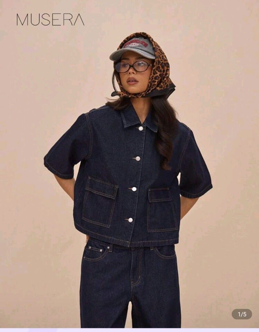 MUSERA Short Sleeve Cropped Denim Jacket Shirt (Category: Coats, Jackets and Outerwear) located in Manila. Submitted by yuna.com (Listing ID 1440352509, Image 1). Description: Product Measurement Shoulder: 43 cm, Bust: 100 cm, Length: 51.8 cm, Sleeve Length: 27.8 cm, Cuff: 35.5 cm .