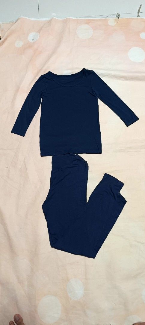 Navy Blue Long Sleeve Pajama Set (Category: Undergarments & Loungewear) located in Davao. Submitted by fabmegashop (Listing ID 1440324087, Image 1). Description: - Comfy navy blue pajama set - Long sleeve top and matching pants - Soft fabric, perfect for lounging or sleeping - Top length: approx. 20 inches - Sleeve length: approx. 22 inches - Pants feature an elastic waistband - Ideal for ultimate relaxation at home.
