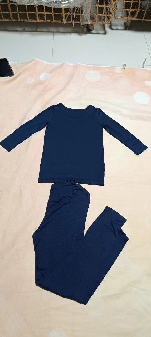 Navy Blue Long Sleeve Pajama Set (Category: Undergarments & Loungewear) located in Davao. Submitted by fabmegashop (Listing ID 1440324087, Image 2). Description: - Comfy navy blue pajama set - Long sleeve top and matching pants - Soft fabric, perfect for lounging or sleeping - Top length: approx. 20 inches - Sleeve length: approx. 22 inches - Pants feature an elastic waistband - Ideal for ultimate relaxation at home.