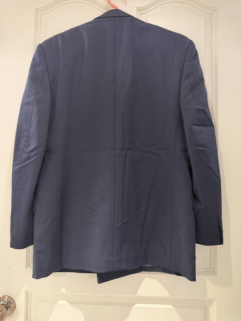 Navy Double-Breasted Blazer (Category: Coats, Jackets and Outerwear) located in Singapore. Submitted by audkk (Listing ID 1440329927, Image 2). Description: - Classic navy double-breasted blazer - Two-button front closure - Two front flap pockets - Standard fit - Perfect for formal or smart casual occasions - Ready for a new owner PTP 16" Length 28".