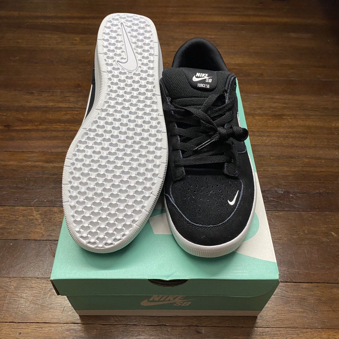 Nike SB Force 58 Skate Shoes (Category: Sneakers) located in Valenzuela. Submitted by aplusmnl (Listing ID 1440227889, Image 3). Description: - Authentic Nike SB Force 58 skate shoes - Color: Black and White - Durable suede upper with perforations for breathability - Classic Nike Swoosh detail - Grippy tread pattern on the sole for skateboarding - Comes with original box.