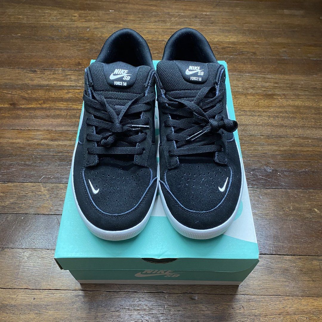 Nike SB Force 58 Skate Shoes (Category: Sneakers) located in Valenzuela. Submitted by aplusmnl (Listing ID 1440227889, Image 2). Description: - Authentic Nike SB Force 58 skate shoes - Color: Black and White - Durable suede upper with perforations for breathability - Classic Nike Swoosh detail - Grippy tread pattern on the sole for skateboarding - Comes with original box.