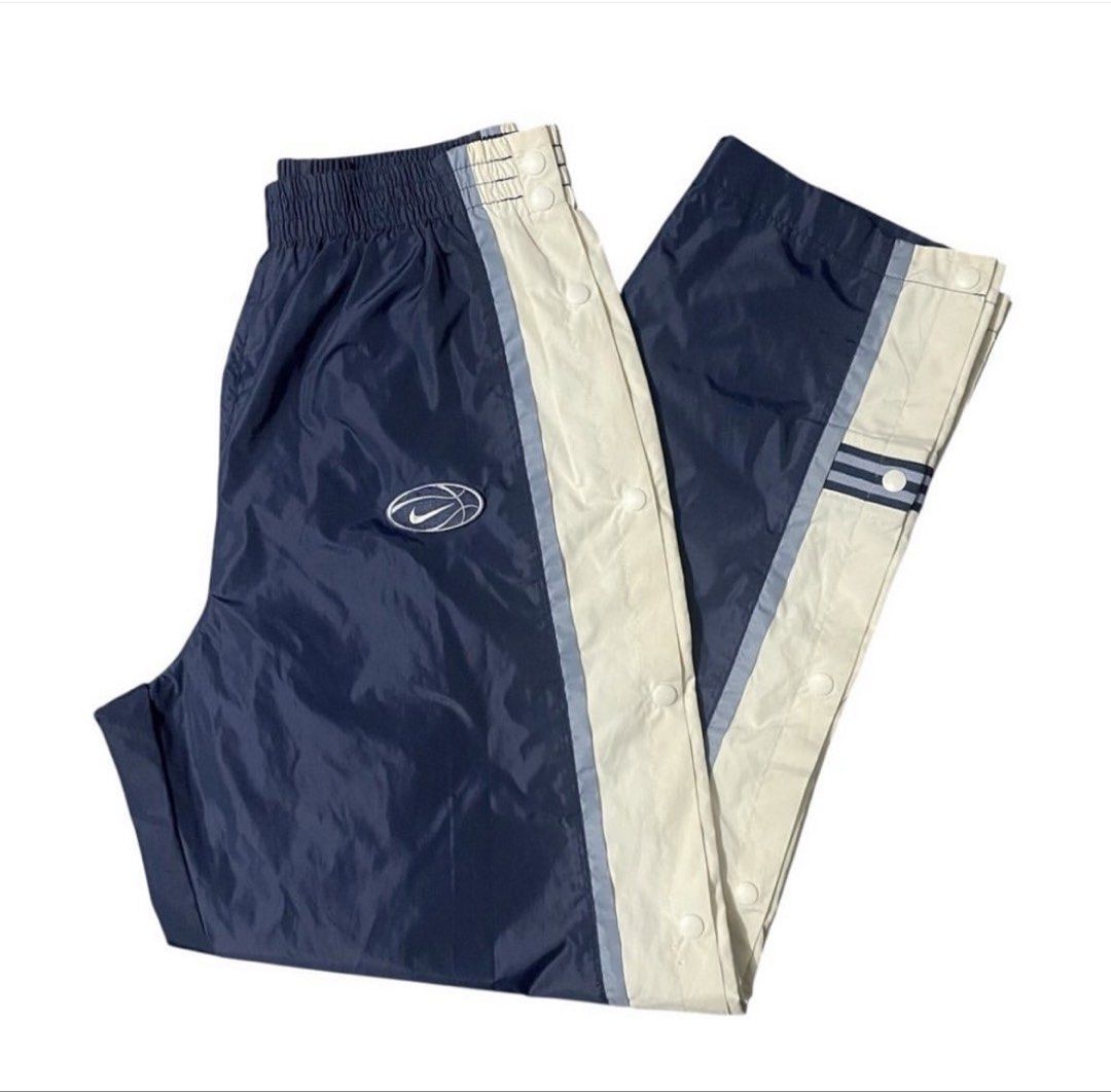 NIKE Y2K TEAR AWAY PANTS (Category: Joggers) located in Manila. Submitted by gotstar (Listing ID 1440249744, Image 1). Description: NIKE VINTAGE TEAR AWAY TRACKPANTS ~ Size XL Dimensions• Width: 30-40 Length: 42 ~ Excellent Condition Issue: Yellowish white part 9/10 Overall Condition ~ ₱1499 ~ Price does not include shipping fee Check details before buying Color may vary due to lightning.
