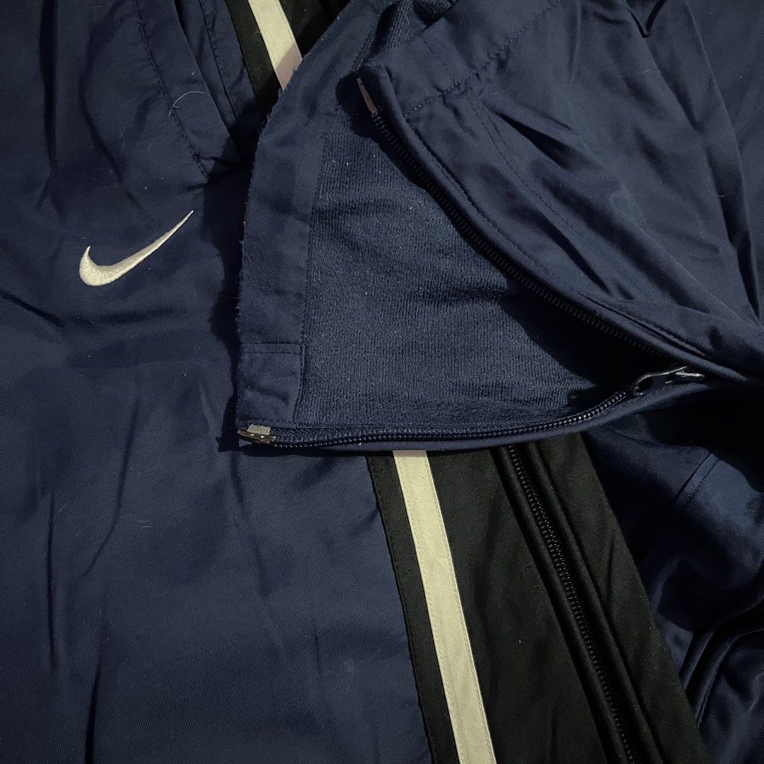 NIKE Y2K TRACK PANTS FULL SIDE ZIP (Category: Joggers) located in Manila. Submitted by gotstar (Listing ID 1440250007, Image 2). Description: NIKE Y2K NAVY PANTS FULL ZIP SIDE ~ Dimensions• Width: 34 Length: 39 Leg Opening: 9 ~ Good Condition 9/10 Overall Condition ~ ₱999 ~ Price does not include shipping fee Check details before buying Color may vary due to lightning.