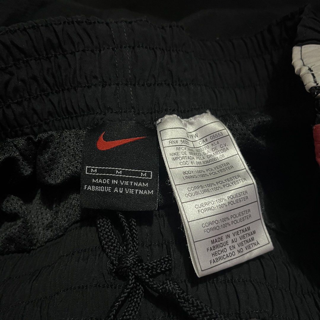 NIKE Y2K TRACK PANTS FULL SIDE ZIP (Category: Joggers) located in Manila. Submitted by gotstar (Listing ID 1440250790, Image 3). Description: NIKE Y2K TRACKPANTS BLACK RED ~ Dimensions• Width: 28-36 Length: 39 Leg Opening: 9.5 ~ 9/10 Overall Condition ~ ₱1000 ~ Price does not include shipping fee Check details before buying Color may vary due to lightning.