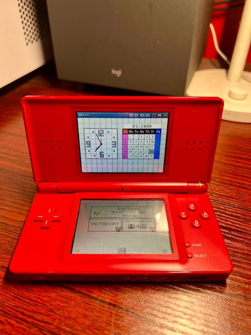 Nintendo DS Lite Rare Asian Release (Category: Nintendo) located in Baguio. Submitted by carlbenta (Listing ID 1440335206, Image 1). Description: - Red Nintendo DS Lite console - Original stylus included - Charging cradle included - Brain Training game included - Tested and confirmed working - Great for on-the-go brain exercises - Classic handheld gaming experience -WORKING WELL -8.5/10 condition Location: Baguio City Shipping: J&T/FLASH/LBC .