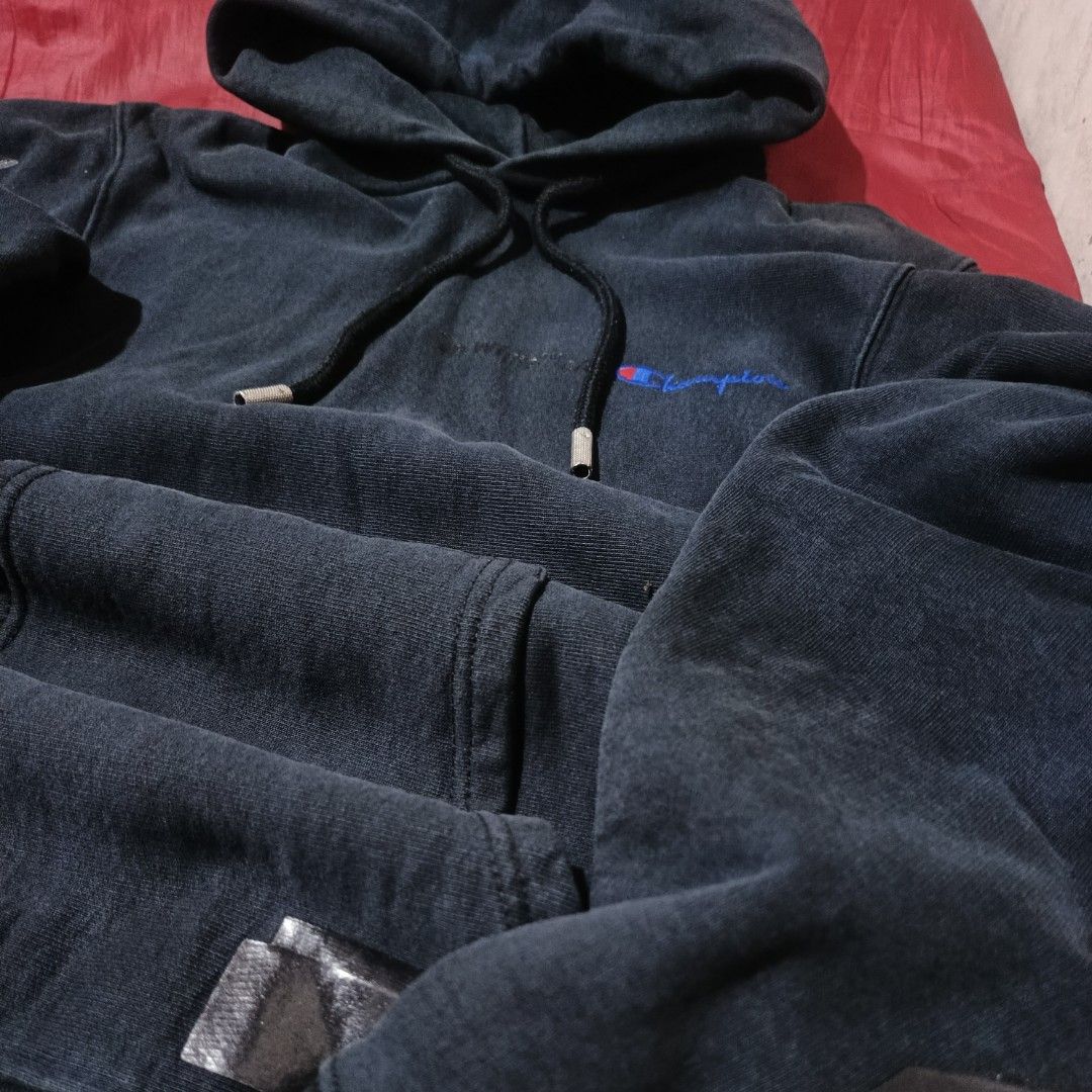 OFF WHITE x Champion Black Washed Hoodie (Category: Hoodies) located in Manila. Submitted by woozyyyy (Listing ID 1440362025, Image 2). Description: - Authentic Off-White x Champion collaboration - Black washed hoodie - Features iconic Champion logo on the chest - Drawstring hood with premium metal tips - Ribbed cuffs and hem for a comfortable fit - Estimated size: Medium - Ideal for casual and streetwear looks.