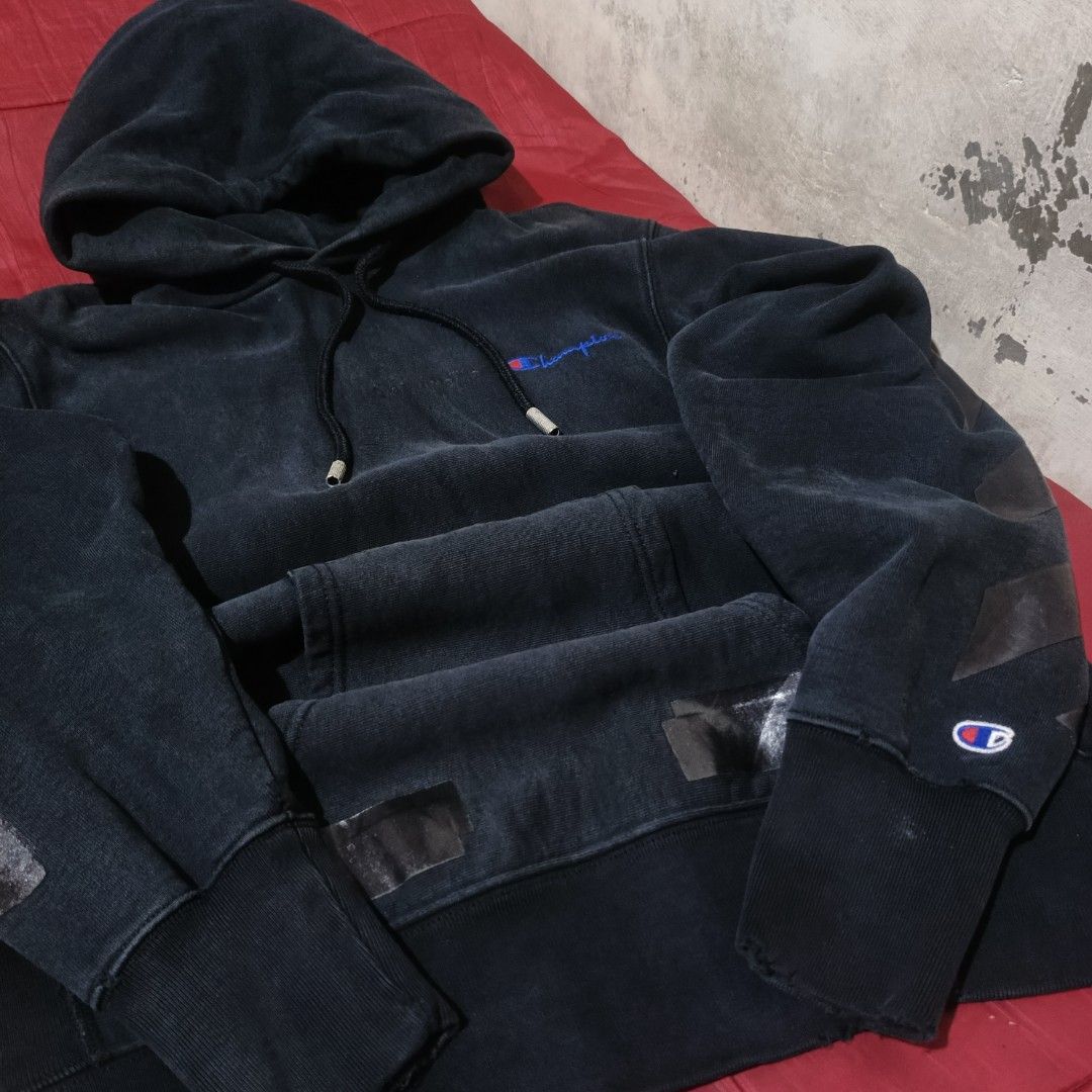OFF WHITE x Champion Black Washed Hoodie (Category: Hoodies) located in Manila. Submitted by woozyyyy (Listing ID 1440362025, Image 3). Description: - Authentic Off-White x Champion collaboration - Black washed hoodie - Features iconic Champion logo on the chest - Drawstring hood with premium metal tips - Ribbed cuffs and hem for a comfortable fit - Estimated size: Medium - Ideal for casual and streetwear looks.