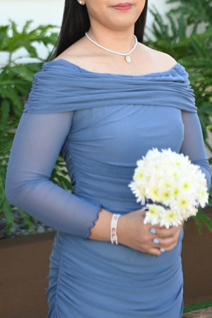 Off-Shoulder Ruched Mesh Evening Gown (Dusty Blue) (Category: Evening dresses & gowns) located in Manila. Submitted by simplymara_1993 (Listing ID 1440220599, Image 2). Description: - Stunning off-shoulder design - Delicate long mesh sleeves - Flattering ruched detailing - Elegant floor-length hemline - Beautiful dusty blue color - Ideal for formal events, weddings, and parties.