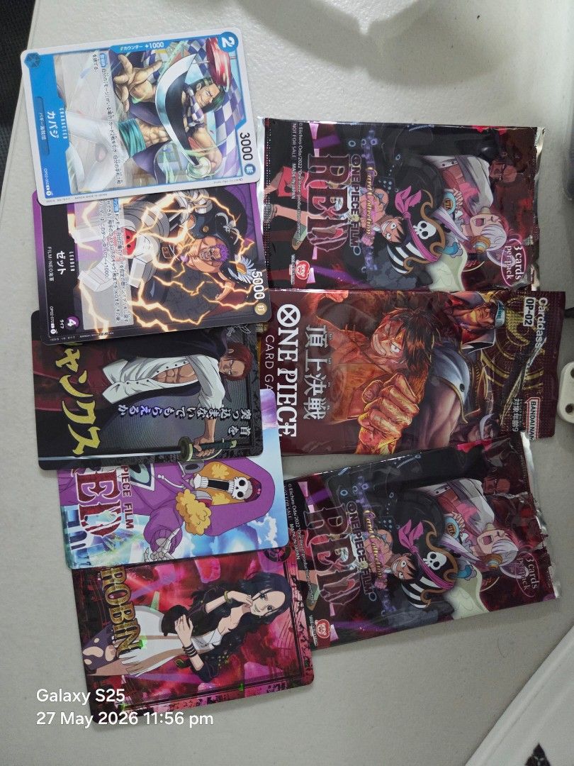 ONE PIECE CARD GAME AND BUTTONS (Category: Everything Else Others) located in Quezon City. Submitted by panchie32 (Listing ID 1440362635, Image 3). Description: Selling my One Piece collectible items. Includes One Piece Cards (opened already) and One Piece buttons/badges. I believe these were from the One Piece Film: Red opening day screening here in PH, and one of the buttons is from the MOS Burger PH collaboration. I'll also include the free On