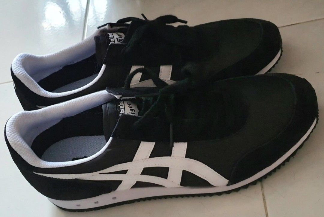 Onitsuka Tiger New York Black White Sneakers (Category: Sneakers) located in Singapore. Submitted by decluttelon (Listing ID 1440202496, Image 1). Description: - Onitsuka Tiger New York sneakers - Color: Black and White - Iconic, classic design - Condition: Excellent!! Brand new not worn before!! - Perfect for daily wear or a retro look - Stylish and comfortable - Bought in Japan (100% authentic!!!) Negotiable but please do not low ball!!.