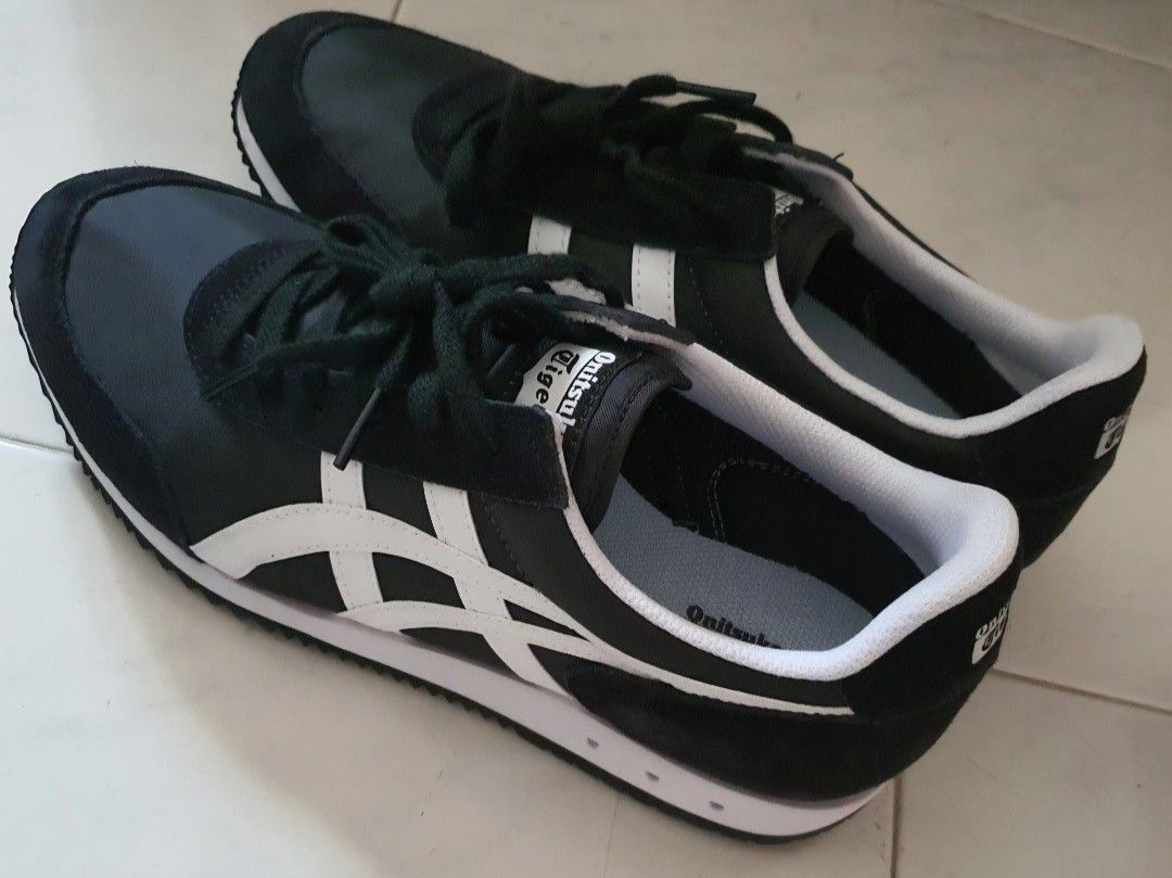 Onitsuka Tiger New York Black White Sneakers (Category: Sneakers) located in Singapore. Submitted by decluttelon (Listing ID 1440202496, Image 2). Description: - Onitsuka Tiger New York sneakers - Color: Black and White - Iconic, classic design - Condition: Excellent!! Brand new not worn before!! - Perfect for daily wear or a retro look - Stylish and comfortable - Bought in Japan (100% authentic!!!) Negotiable but please do not low ball!!.
