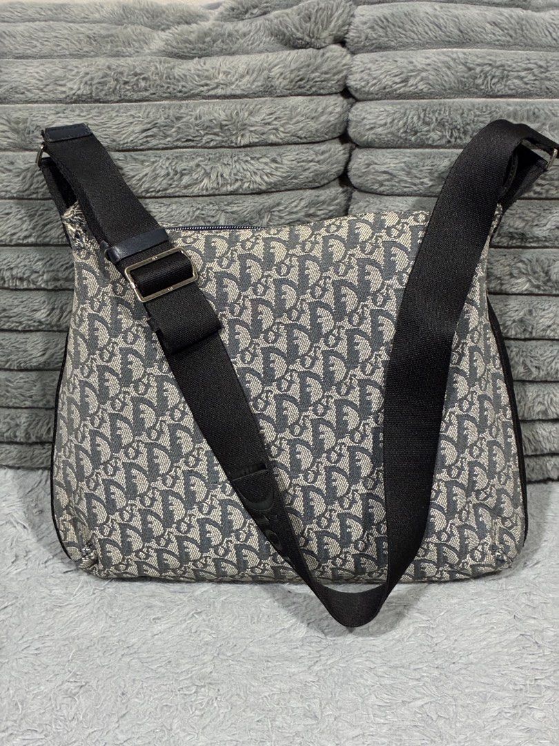 Original Dior Vintage Trotter Messenger bag (Category: Luxury Bags & Wallets) located in Manila. Submitted by cellymeji060371 (Listing ID 1440300069, Image 2). Description: Authentic Flaws: Dior logo not visible anymore, hence the low price Underzip has the Christian Dior markings .