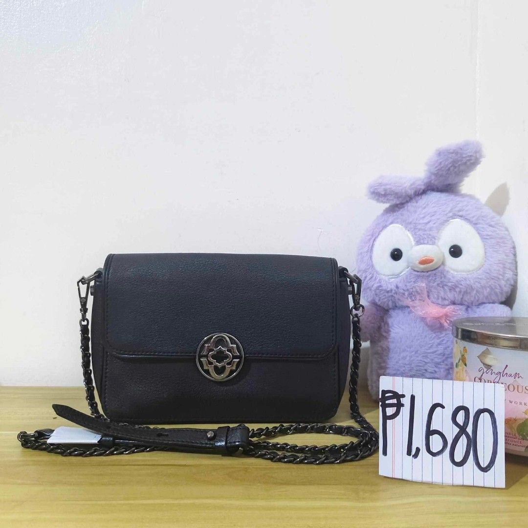 Oryany Gerard Black Crossbody Bag (Category: Cross-body Bags) located in San Pedro. Submitted by riavskz (Listing ID 1440269658, Image 1). Description: 👜 Oryany Gerard Black Crossbody Bag • Japan/Korea sourced preloved bag • Soft shrunken cow leather body • Black colorway • Square-shaped crossbody bag silhouette • Flap edge piping detail adds structure and firmness • Divided internal compartments for better organization • Compact yet highly prac