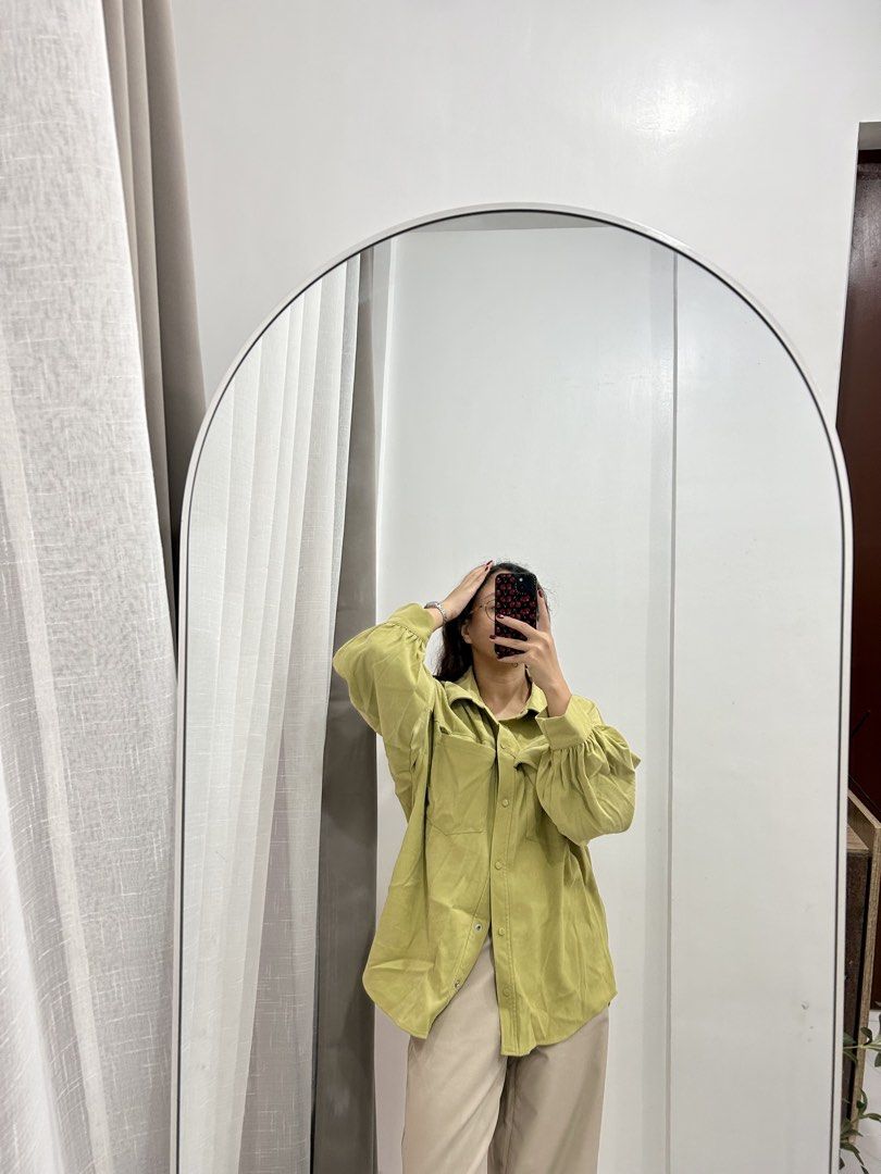 Oversized Green Button-Up Shirt with Puffy Sleeves (Category: Shirts) located in Caloocan City. Submitted by avryph (Listing ID 1440366304, Image 2). Description: - Oversized green shirt - Button-up style - Two chest pockets - Puffy sleeves with button cuffs - Relaxed fit - Ideal for casual wear - Easy to style MOP: Gcash/BPI Thru J&T Express .