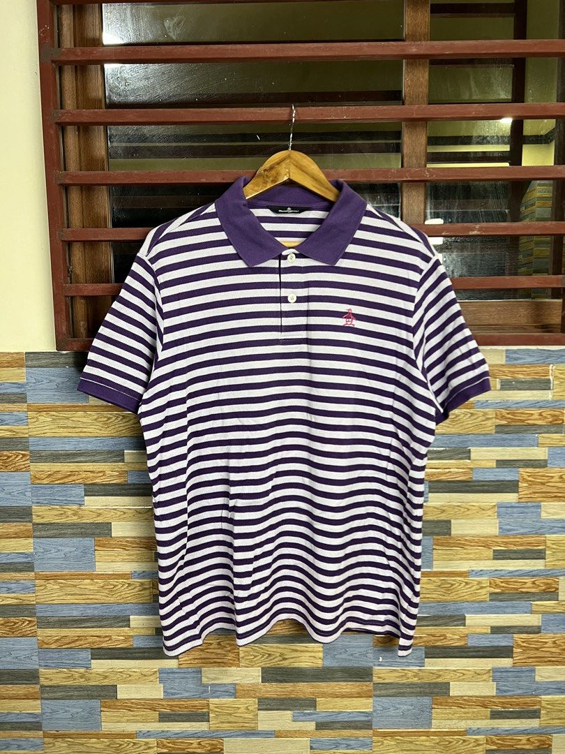 Penguin Munsingwear Polo Shirt (Category: Tshirts & Polo Shirts ) located in Iba. Submitted by saploot (Listing ID 1440361416, Image 1). Description: - Munsingwear Polo Shirt - 22x28 - Color: Purple and White Stripes - Sleeve Length: Short Sleeves - Closure: Button-up Front - Features: Embroidered Munsingwear Penguin Logo on Chest - Origin: Made in Japan - Style: Casual Wear.