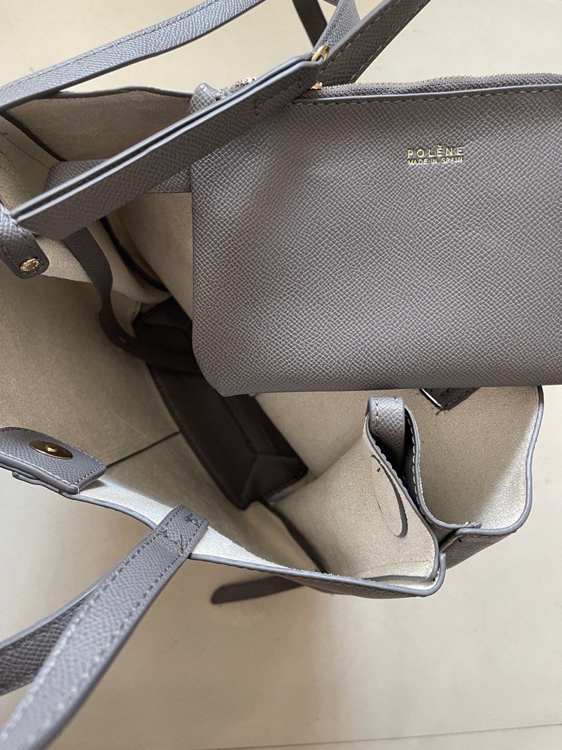 Polène Grey Textured Leather Tote Bag with Pouch (Category: Tote Bags) located in Quezon City. Submitted by kingcurator (Listing ID 1440272273, Image 3). Description: - Grey Polène tote bag - Textured leather - Includes matching inner pouch - Features top handles - Detachable shoulder strap included - Secure magnetic snap closure - Crafted in Spain - Ideal for daily use - Compressed in luggage not yet used - Bag included only with small pouch ins