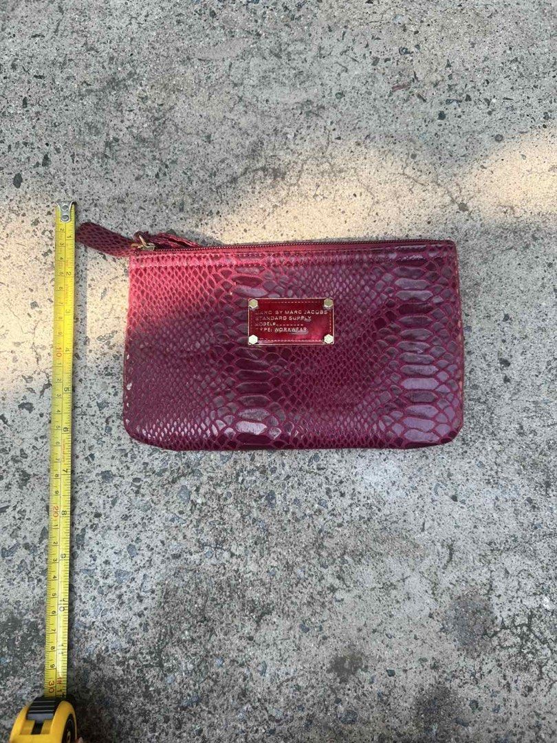 Pouch Burgundy Snake Print Wristlet (Category: Luxury Bags & Wallets) located in San Juan City. Submitted by outwithit (Listing ID 1440325801, Image 1). Description: Dm for more information -More pictures about the product -Close up pictures -Type of material RFS: Decluttering Can negotiate if buying 2 or more items Delivery fee will be shouldered by buyer Strictly payment first if delivery/ No COD DM FOR MORE INFORMATION!.