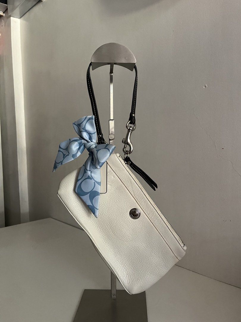 rare coach white hampton wristlet blue bow (Category: Luxury Bags & Wallets) located in Bulacan. Submitted by femalethings (Listing ID 1440223014, Image 3). Description: mop gcash, bdo mod jnt🚚 🏷️ kindly manage expectations - signs of use, aging, and minor imperfections are normal for vintage pieces. - colors may slightly vary in different lighting🤎.