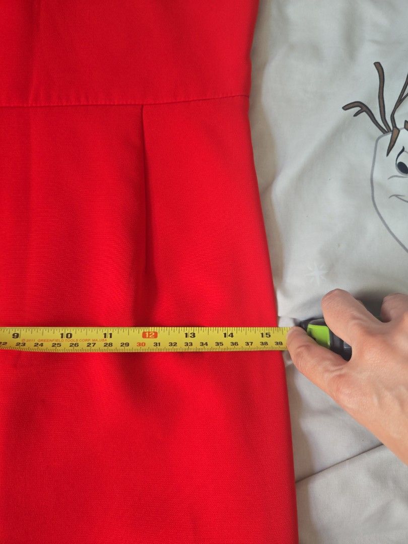 Celine one sided sleeve asymmetrical drss (Category: Dresses) located in Pasig City. Submitted by izzy0202 (Listing ID 1440212143, Image 3). Description: - Eye-catching bright red dress - Short sleeves for a comfortable fit - Convenient zipper closure at the back - Fabric has a nice stretch for a flattering silhouette - Approximate measurements: Bust 14 inches, Waist 15 inches - Ideal for parties, events, or a fun night out -cut tags -great fabri
