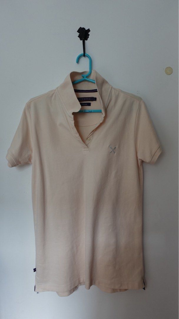 Regatta Essentials Peach Polo Shirt Size S (Category: Others Tops) located in Binan City. Submitted by fiercefox_b5163c (Listing ID 1440273893, Image 2). Description: - Regatta Essentials peach polo shirt - Comfortable cotton blend fabric - Classic collar and short sleeves - Small embroidered logo on chest - Striped trim detail on hem - Ideal for casual wear.