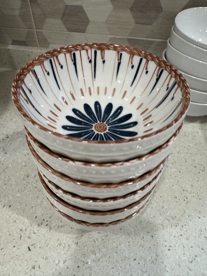 Set of 6 Ceramic Bowls (Category: Dinnerware & Cutlery) located in Klang. Submitted by jwaloha (Listing ID 1440265497, Image 2). Description: -fragile item, self-collect only. Set of 6 beautiful ceramic bowls - Unique designs (floral & abstract) - Braided texture on rims - Ideal for serving snacks, rice, or soup - Dishwasher and microwave safe - Adds a lovely touch to your dining table.