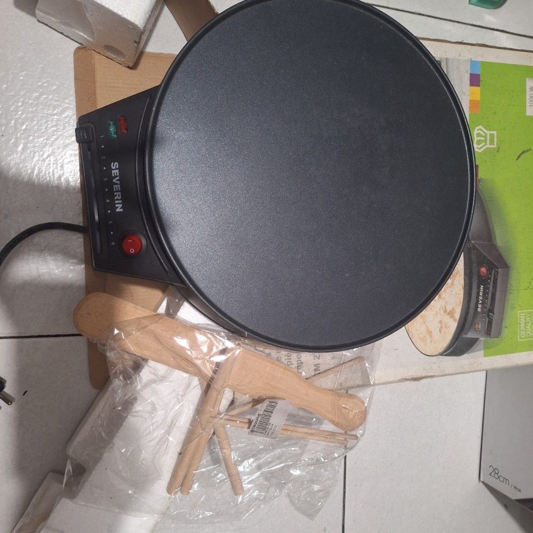 Severin Crepes Maker CM 2198 (Category: Other Kitchen Appliances) located in Manila. Submitted by singingmamay (Listing ID 1440368507, Image 2). Description: - Severin Crepe Maker (Model CM 2198) - Includes wooden crepe spreader and roller - Non-stick cooking plate for easy release - Power: 220-240V, 50/60Hz, 1000W - Ideal for making delicious crepes and pancakes - Simple to operate and clean.