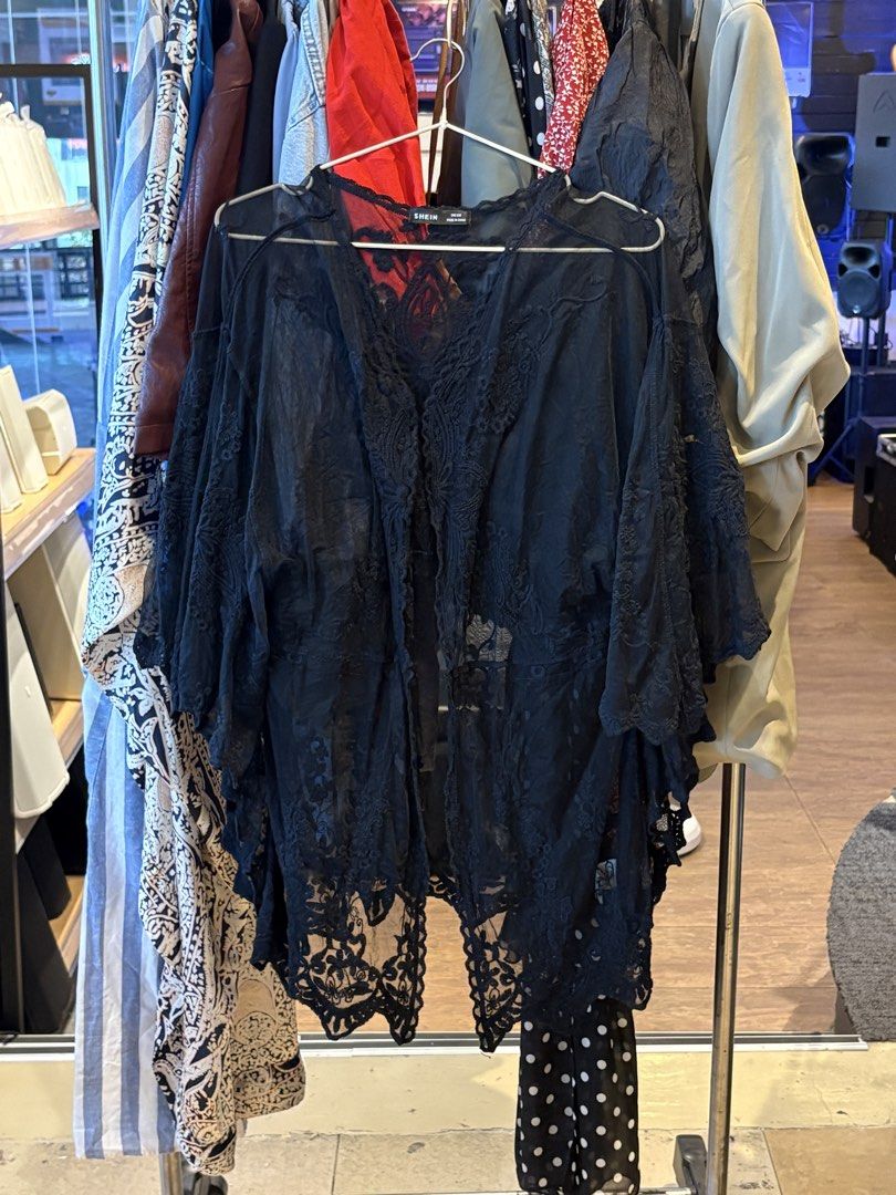 SHEIN Black Lace Kimono One Size (Category: Coats, Jackets and Outerwear) located in Marikina City. Submitted by delriogrande (Listing ID 1440307261, Image 1). Description: Black sheer lace kimono with embroidered floral details. * Brand: SHEIN * One size * Sheer mesh fabric * Floral lace embroidery * Open front * Condition: Good used condition.