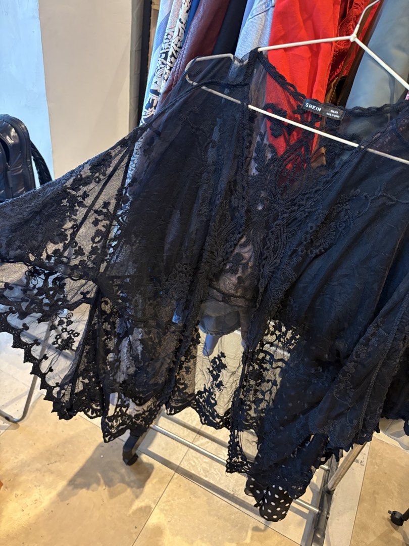 SHEIN Black Lace Kimono One Size (Category: Coats, Jackets and Outerwear) located in Marikina City. Submitted by delriogrande (Listing ID 1440307261, Image 2). Description: Black sheer lace kimono with embroidered floral details. * Brand: SHEIN * One size * Sheer mesh fabric * Floral lace embroidery * Open front * Condition: Good used condition.