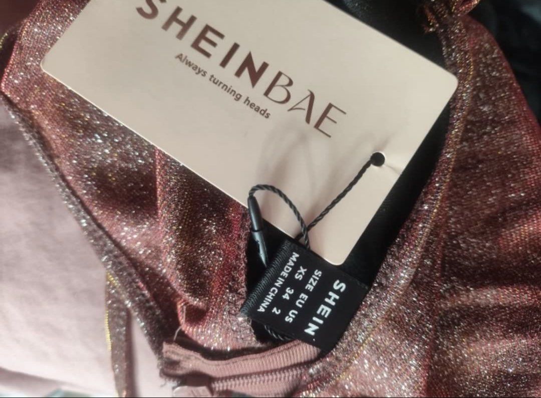 SHEINBAE Ruched Halter Neck Dress (Category: Dresses) located in Quezon City. Submitted by decluttrph_ (Listing ID 1440292857, Image 3). Description: - Perfect for night outs and parties - Size XS (US 2, EU 34) - Please note: Minor flaws on the fabric, kindly check photos for details. (hindi siya butas) .