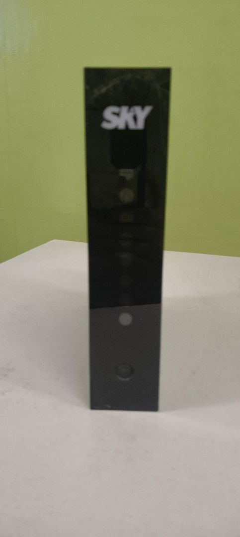 SKY Internet Modem Router (Category: Networking) located in Manila. Submitted by luizzi (Listing ID 1440247465, Image 1). Description: - Black SKY internet modem router - Prominent SKY logo on front and top - Front panel with indicator lights and power button - Textured grid pattern on top - Ideal for home internet connectivity.