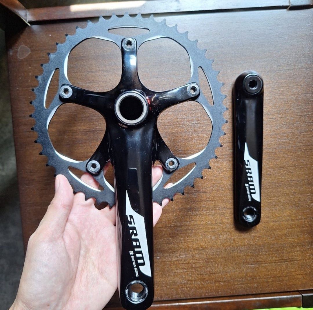 SRAM Crankset with Chainring and Crank Arm (Category: Bicycles) located in San Simon. Submitted by shutyourself0101211 (Listing ID 1440310460, Image 1). Description: - SRAM crankset - Includes main crankset with chainring and separate crank arm - Features SRAM logo on crank arm - Ideal for upgrading your bicycle.