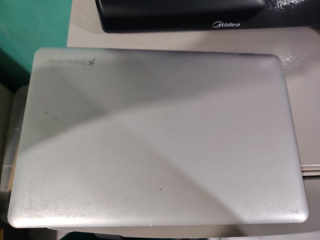 Starmobile Laptop Silver untested (Category: Laptops & Notebooks) located in Manila. Submitted by lfg92 (Listing ID 1440319435, Image 2). Description: - Starmobile laptop - Screen is visible and functional - Keyboard and trackpad are in place - Suitable for everyday tasks.