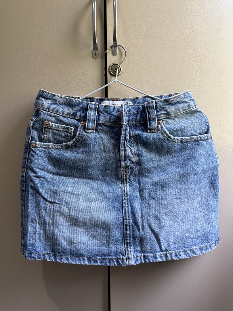Stradivarius Blue Denim Mini Skirt Size 34 (Category: Skirts) located in Manila. Submitted by michikoy02 (Listing ID 1440344178, Image 1). Description: - Stradivarius blue denim mini skirt - Classic five-pocket style - Button and zip closure - Made in Bangladesh - Ideal for casual outfits - Versatile: easy to pair with tops and shoes.