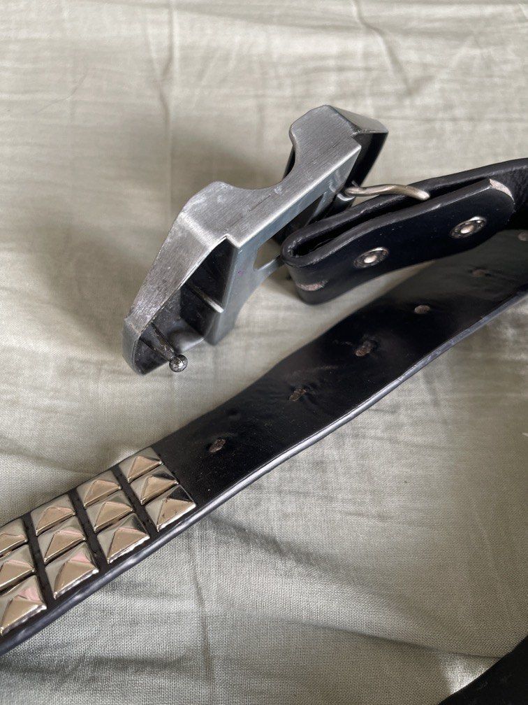 Studded black leather novelty belt with lighter case (Category: Belts) located in Manila. Submitted by moolodica (Listing ID 1440239504, Image 3). Description: I lost the kerosene lighter :( 43” or 110cm RFS: raising funds to pay for my cat’s surgery.
