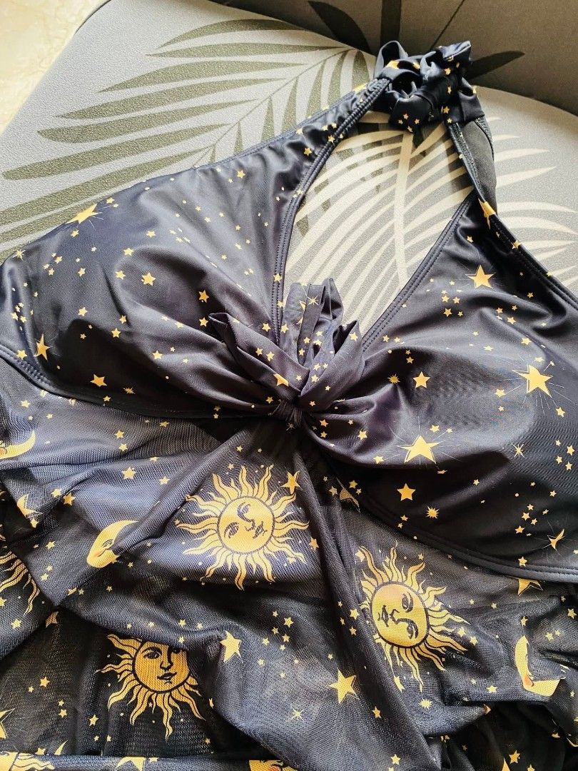 Swimsuit 3xl to 5xl (Category: Bikinis & Swimsuits) located in Cainta. Submitted by sjprelovedbotique (Listing ID 1440381397, Image 2). Description: Black halter cover-up with celestial print (suns, moons, stars in gold). Sheer mesh skirt. Ties at neck and back. Perfect for beach or pool..